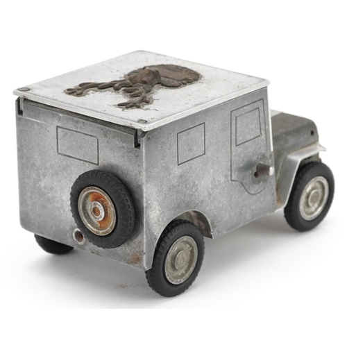 290 - A German Baier 1947 aluminium table cigarette lighter and box in the form of an army truck, 14cm in ... 