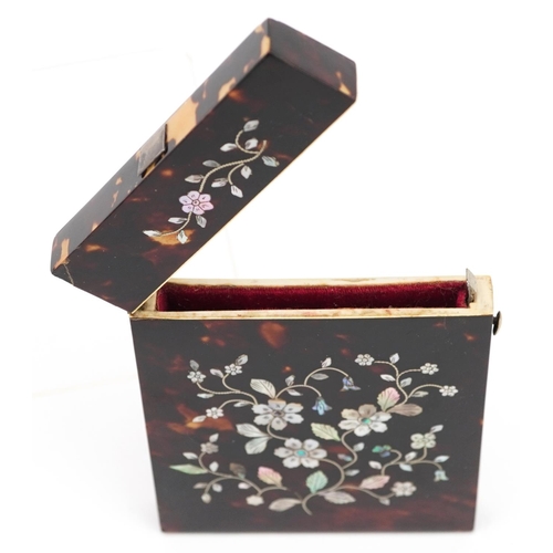 130 - A Victorian tortoiseshell and mother-of-pearl inlaid card case, 11cm high x 8cm wide.