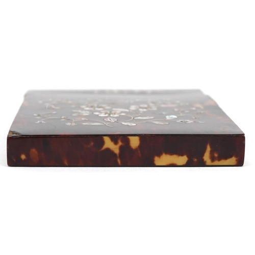 130 - A Victorian tortoiseshell and mother-of-pearl inlaid card case, 11cm high x 8cm wide.