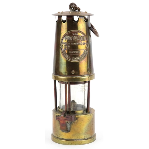 354 - An early 20th century brass miner's lamp, The Protector, by The Lamp & Lighting Company Eccles, Manc... 