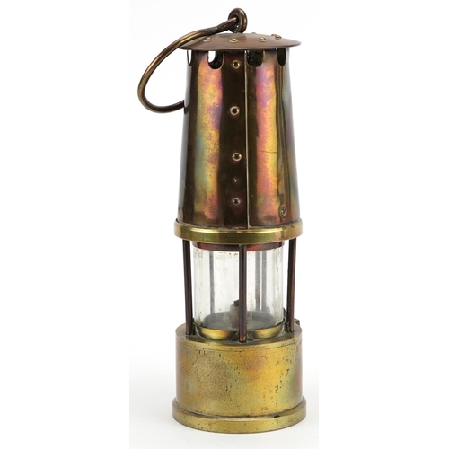 354 - An early 20th century brass miner's lamp, The Protector, by The Lamp & Lighting Company Eccles, Manc... 