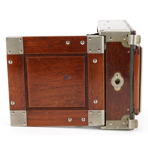 476 - An early 20th century Ika, Dresden quarter-plate mahogany case field camera, 16cm wide.