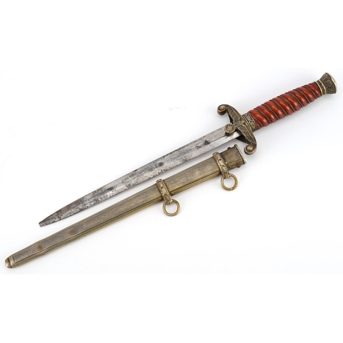 746 - A German military interest dagger with scabbard, 40cm in length.