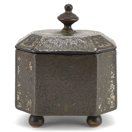 131 - A Georgian cast iron tobacco box with tamper, engraved with a phoenix and sailing ship, possibly rel... 