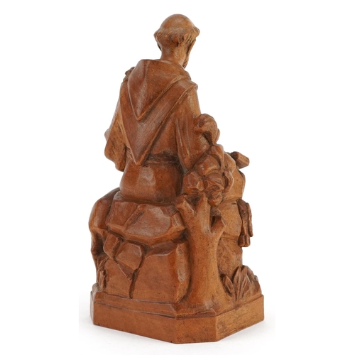 16 - A late 19th/early 20th century lime wood carving of St. Francis, 17.5cm high