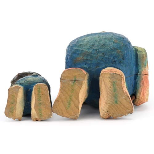 1209 - Two hand carved and hand painted wooden Norwegian trolls by Sandu Kunof?, the largest 18cm high.