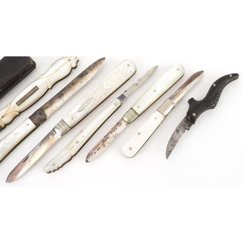 38 - Five 19th century silver and mother of pearl folding fruit knives, one other with steel blade and on... 