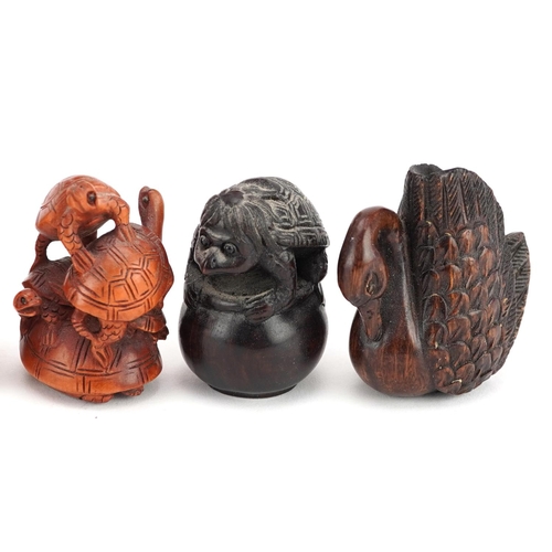 107 - Eight Chinese carved wood netsukes including a swan, tortoises, rat and children, the largest 4.5cm ... 