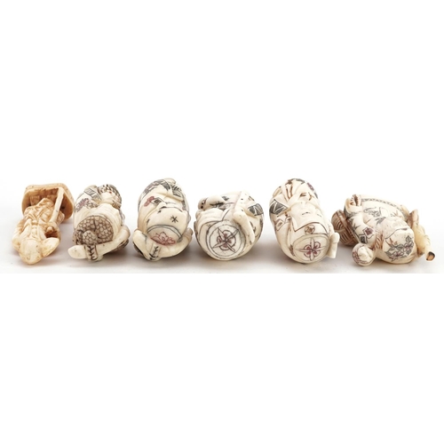 1207 - Five Chinese carved bone netsuke figures and one other, the largest 8cm high.