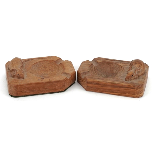 36 - Robert 'Mouseman' Thompson, two oak ashtrays, each carved with a signature mouse, 10cm in length.