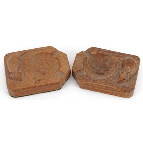 36 - Robert 'Mouseman' Thompson, two oak ashtrays, each carved with a signature mouse, 10cm in length.