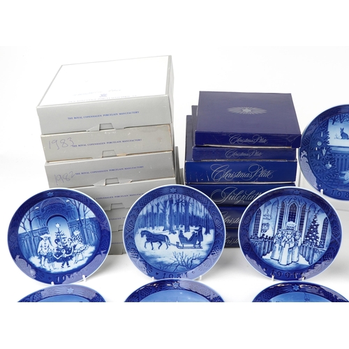 443 - A collection of thirteen Royal Copenhagen porcelain Christmas plates, all boxed.