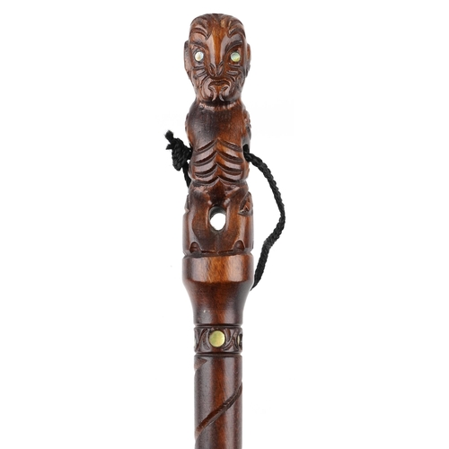 285 - A late 20th century African carved softwood walking stick with carved figural handle, 92cm in length... 