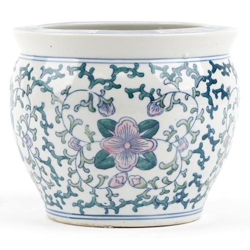 1180 - A 20th century Chinese porcelain jardinière hand painted with flowers, 18cm high.