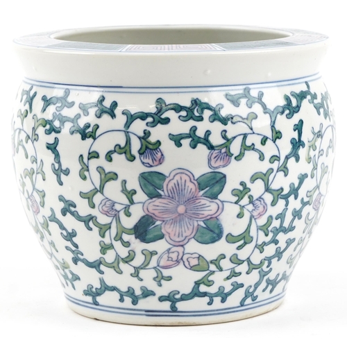 1180 - A 20th century Chinese porcelain jardinière hand painted with flowers, 18cm high.