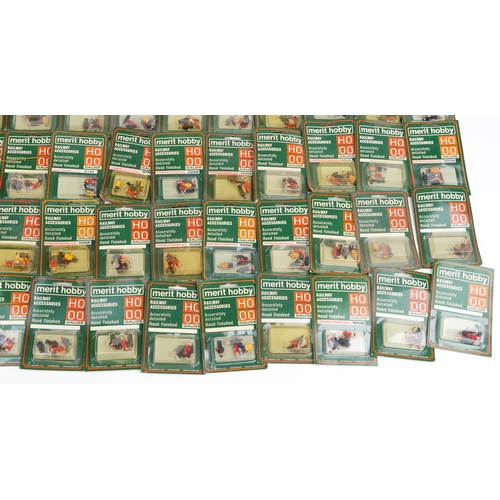 569 - A collection of approximately 100 Merit Hobby HO & OO gauge hand painted railway figures, various se... 