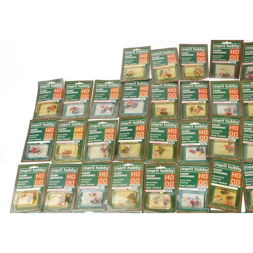 568 - A collection of approximately 100 Merit Hobby HO & OO gauge hand painted railway figures, various se... 