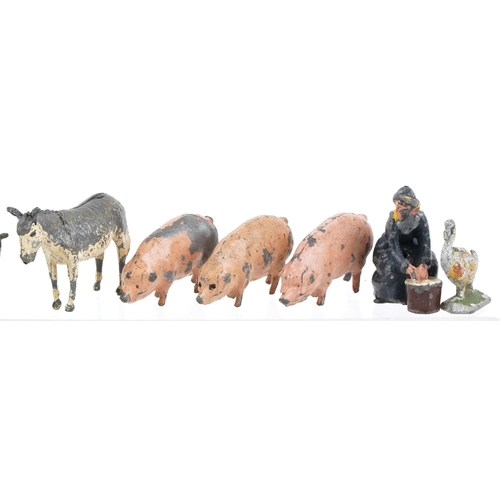 528 - A small collection of vintage Britains hand painted lead farm animals.