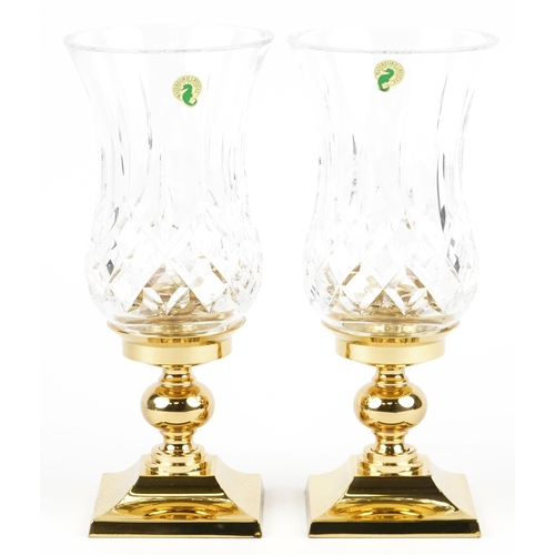 442 - Two Waterford, 'The Crystal & Brass Collection' Lismore hurricane candlestick holders, H-28cm, boxed... 