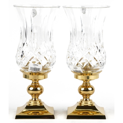 442 - Two Waterford, 'The Crystal & Brass Collection' Lismore hurricane candlestick holders, H-28cm, boxed... 