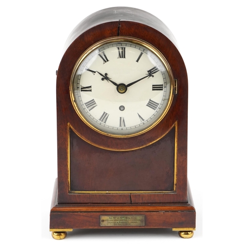 110 - An Edwardian mahogany cased mantle clock with brass inlay, the circular white enamelled dial with bl... 