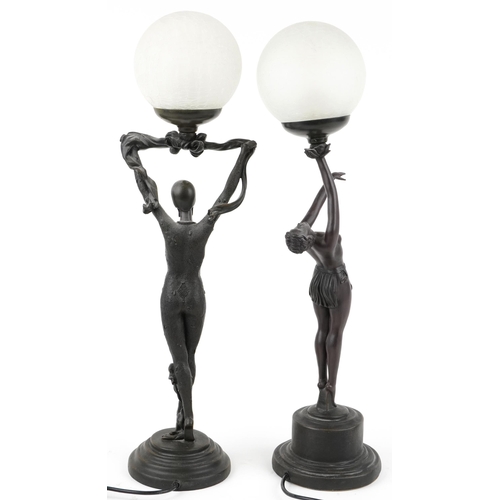 355 - Two similar Art Deco style figural table lamps, 66cm high.