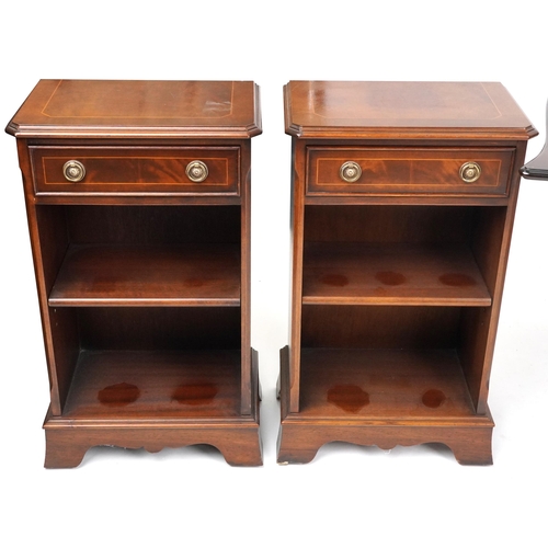 1029 - A pair of late 20th century mahogany bookcases together with a figured mahogany nest of three occasi... 