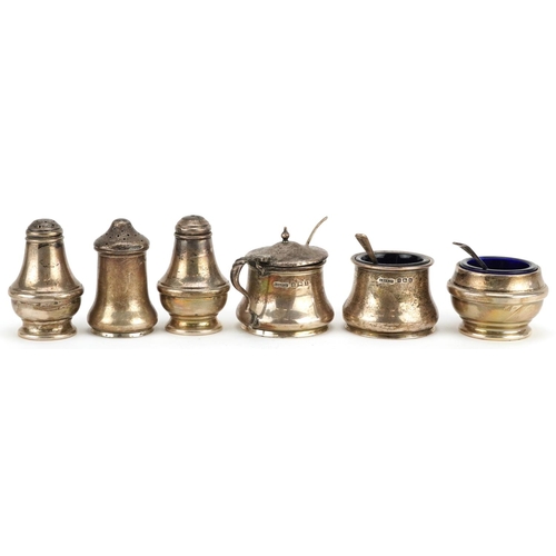 686 - 1920s and later silver cruets, some with blue glass liners, including a mustard with hinged lid, the... 