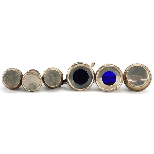 686 - 1920s and later silver cruets, some with blue glass liners, including a mustard with hinged lid, the... 