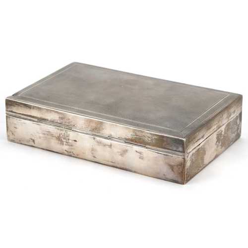 639 - Carrington & Co, Elizabeth II silver cigar box with engine turned hinged lid, London 1967, 14cm wide... 