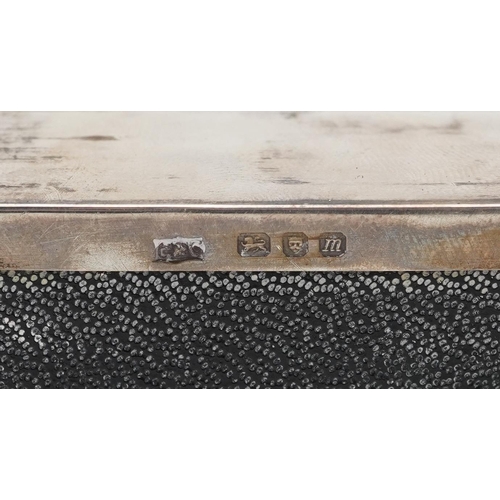 639 - Carrington & Co, Elizabeth II silver cigar box with engine turned hinged lid, London 1967, 14cm wide... 