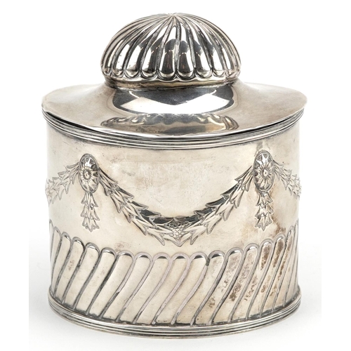 645 - Goldsmiths & Silversmiths Co Ltd., an Edwardian silver caddy with original caddy spoon to the inside... 