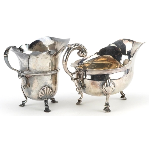 677 - Two Victorian and later silver cream jugs, each raised on three hoof feet, the larger London 1896, 1... 