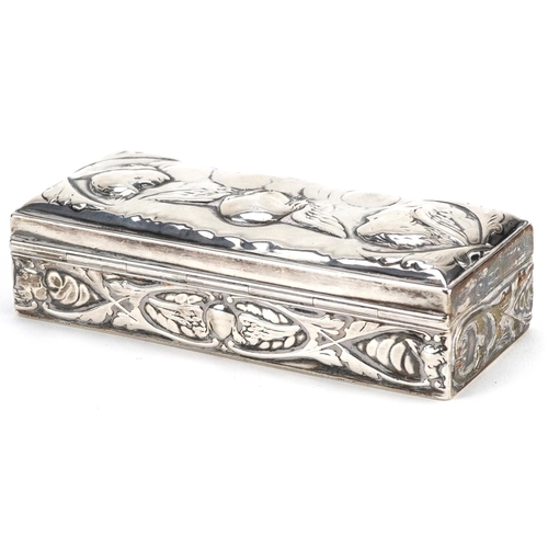 690 - William Comyns, a Victorian silver box with hinged lid, embossed with Putti and stylized flowers, Lo... 