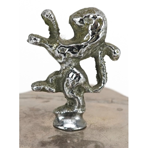 689 - An Edwardian serpentine silver caddy with white metal lion knop, Birmingham 1909, 10cm high, 122.4g.