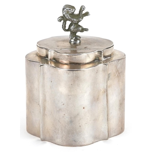 689 - An Edwardian serpentine silver caddy with white metal lion knop, Birmingham 1909, 10cm high, 122.4g.