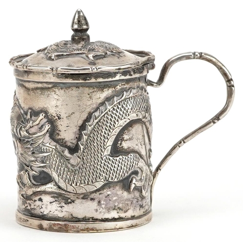 681 - Wang Hing, a Chinese export silver mustard embossed with a dragon, impressed marks to the base, 6cm ... 