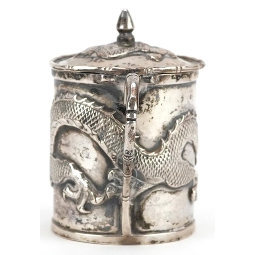 681 - Wang Hing, a Chinese export silver mustard embossed with a dragon, impressed marks to the base, 6cm ... 