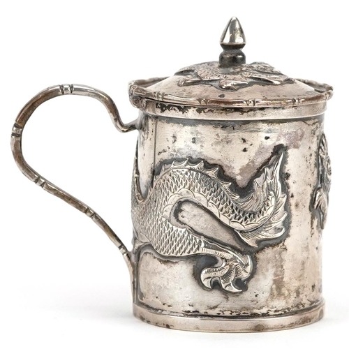 681 - Wang Hing, a Chinese export silver mustard embossed with a dragon, impressed marks to the base, 6cm ... 