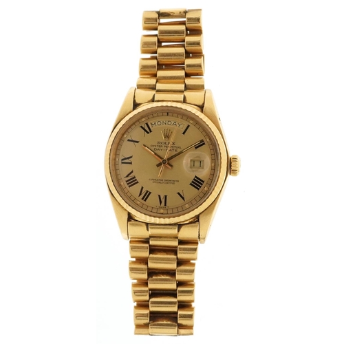 26 - Rolex, a gentlemen's 18ct gold Rolex Oyster Perpetual Day-Date automatic wristwatch having a Champag... 