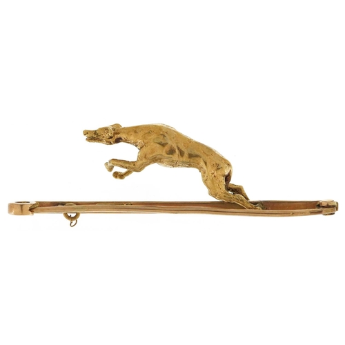 138 - A 9ct gold bar brooch in the form of a Greyhound, 5cm wide, 5.2g.