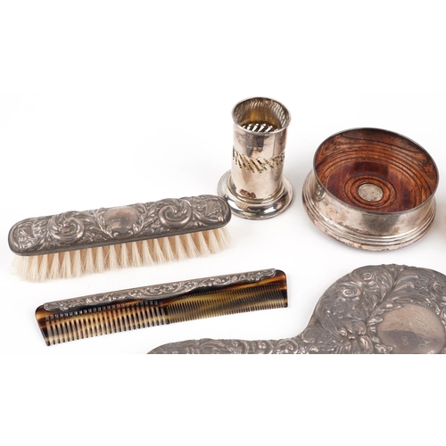 663 - Silver items including silver backed vanity dressing table items profusely embossed with foliage and... 