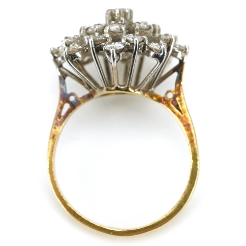 48 - An 18ct gold diamond three tier cluster ring, the ring head 18mm in diameter, size N, 5.0g.