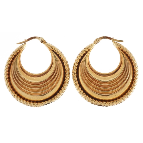 68 - A pair of 9ct gold embossed Gypsy hoop earrings, 3.2cm high, total 5.4g.