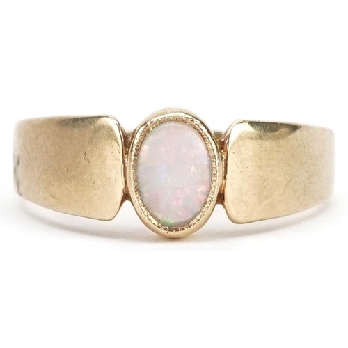 472 - A Modernist 9ct gold cabochon opal ring, size R/S, 3.9g.