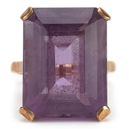 385 - A large 9ct gold rectangular cut amethyst ring, the amethyst approximately 19.80mm x 15.20mm x 11.10... 