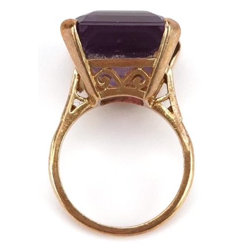 385 - A large 9ct gold rectangular cut amethyst ring, the amethyst approximately 19.80mm x 15.20mm x 11.10... 