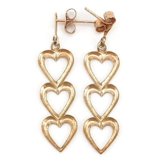 341 - A pair of 9ct gold triple love heart drop earrings, 3.3cm high, total 0.6g.