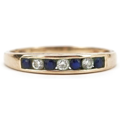 376 - A 9ct gold blue spinel and cubic zirconia seven stone half eternity ring, size P/Q, 1.6g.