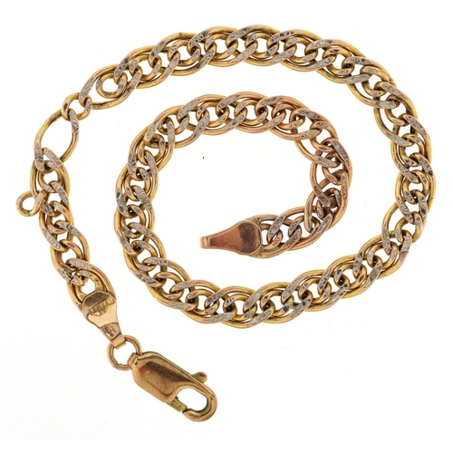 34 - A 9ct gold two tone multi link bracelet, 19.7cm in length, 3.4g.